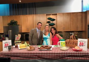 The Rib Chick Candyce Traci stopped by the WKYC “Live on Lakeside” Studios with lots of great grub that will be featured at this year’s Berea’s National Rib Cook-Off. Michael and Hollie enjoyed the taste of summertime with Michael digging in before Candyce even had ribs fully unpacked.