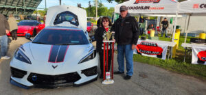 Mike & Lynn Willis with their entry of a 2020 Ceramic White with the Lingenfelter Super-charged 834 horsepower motor car